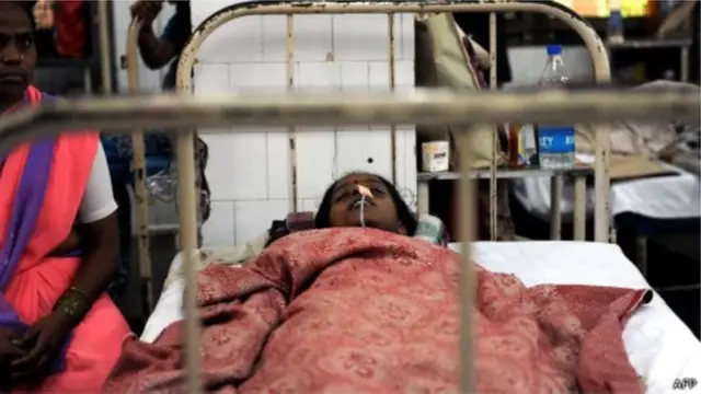 මැලේරියාව වැළඳුනු ඉන්දීය කාන්තාවක්