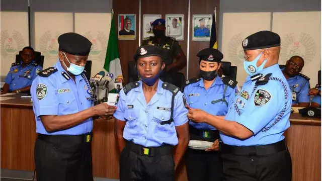 Abbey as police dey decorate her