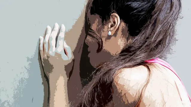 ਚਿੰਤਾ ਵਿੱਚ ਇੱਕ ਕੁੜੀ ਦੀ ਫਾਈਲ ਫੋਟੋ