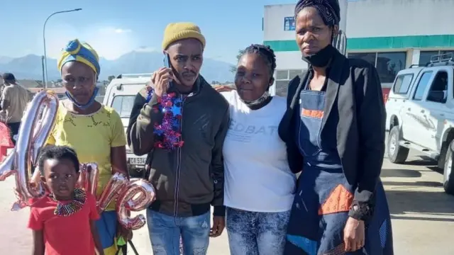 Athenkosi Dyonta with loved ones