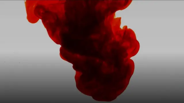 ภาพนามธรรมสีแดงในน้ำ