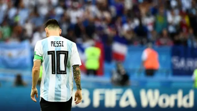 Argentina"s forward Lionel Messi walks on the pitch during the Russia 2018 World Cup round of 16 football match between France and Argentina at the Kazan Arena in Kazan on June 30, 2018.
