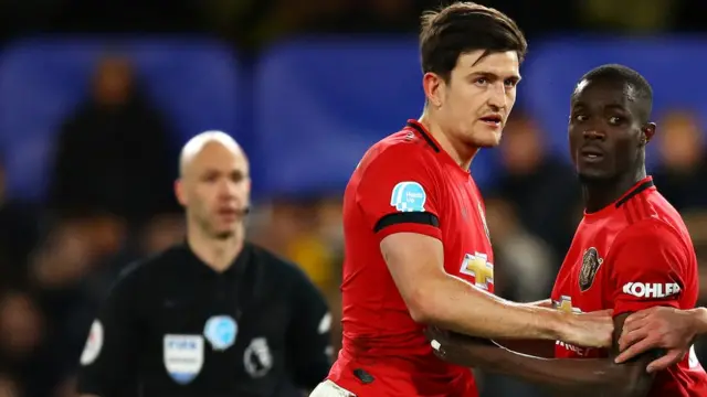 اریک بایی و هری مک‌گوایر، مدافعان منچستر یونایتد