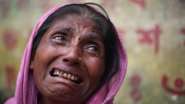 Mulher da etnia Rohingya, aque teve deixa Myanmar