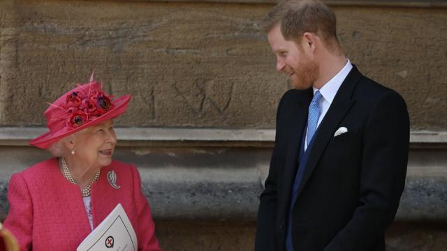 Britain's Queen Elizabeth II chats to Britain's Prince Harry, Duke of Sussex as they leave St George's Chapel in Windsor Castle, Windsor, west of London, on May 18, 2019, after the wedding ceremony of Lady Gabriella Windsor and Thomas Kingston