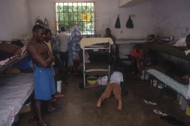Archive image of prisoners in a cell in Haiti in 1998.