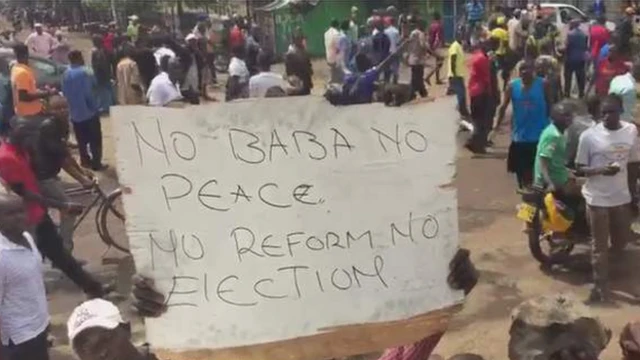 Protesters say dem wan changes before di election on Thursday.