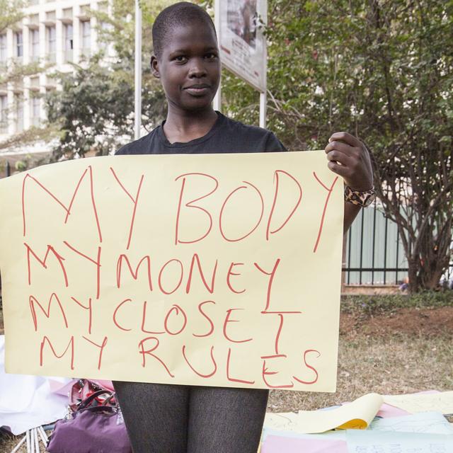 Protester demonstrating against the Anti-Pornography Act's dress code banning miniskirts (2014)
