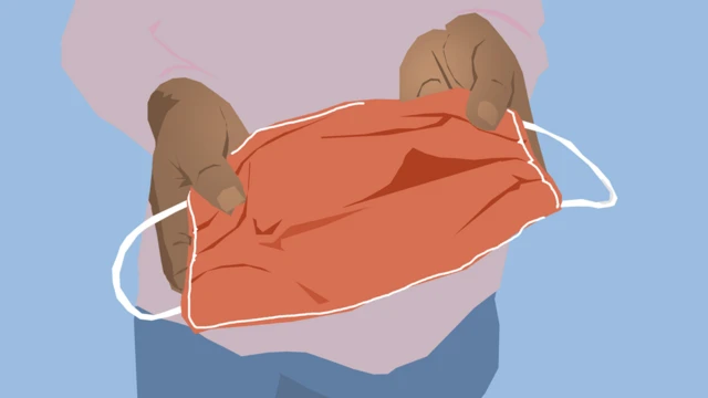 Mask in a person's hands