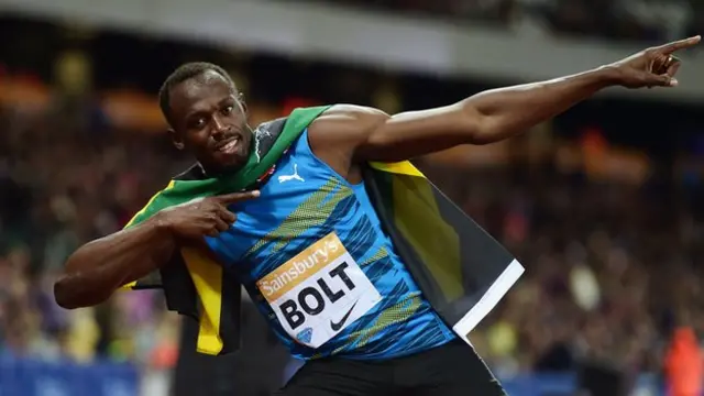 Usain Bolt poses in his trademark Lightning Bolt pose
