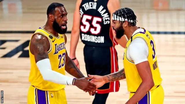 LeBron James and Anthony Davis celebrating during the fourth quarter