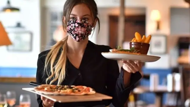 Woman carry food cover face with mask
