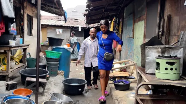 Precious and her daddy about one year afta di interview