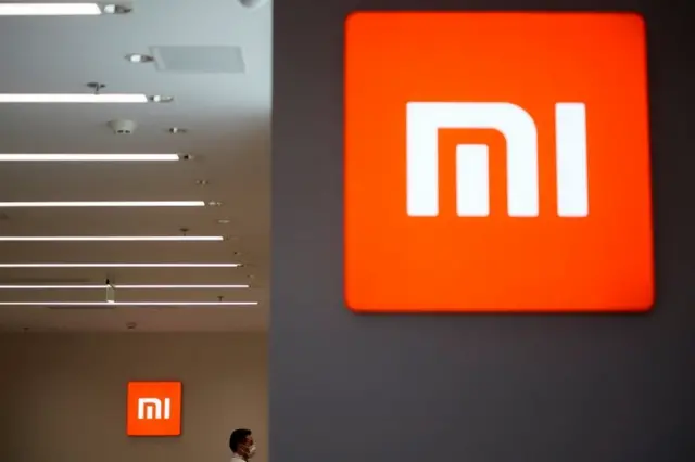 Logo Xiaomi tại một cửa hàng ở Thượng Hải, Trung Quốc vào ngày 12 tháng 5 năm 2021