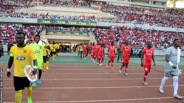 Simba in red before a match against Ghana's Asante Kotoko in 2018