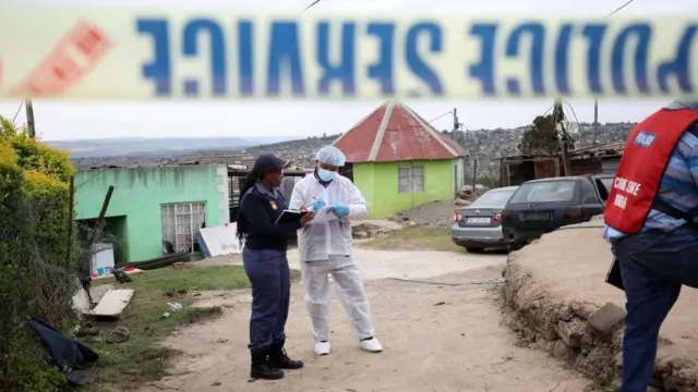 Police dey work for di scene of di deadly mass shooting near Pietermaritzburg, South Africa April 21, 2023