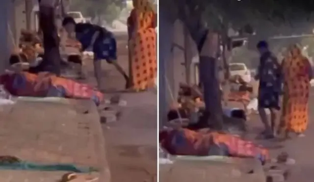 رحمان اللہ گرباز پیسے تقسیم کرتے ہوئے