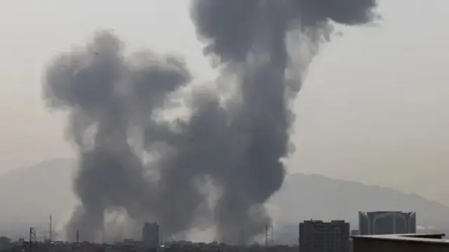 Smoke rise ova Tehran skyline as strikes hit di capital
