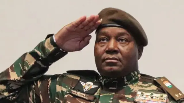 Foto of General Abdourahamane Tchiani wey bin lead di military in a coup two years ago.