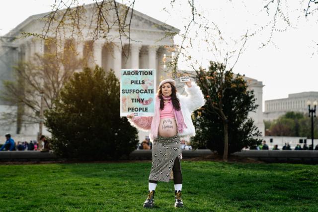 Anti-abortion advocate Melanie Salazar of San Francisco poses for a portrait outside the Supreme Court in Washington, DC, on 26 March 2024 