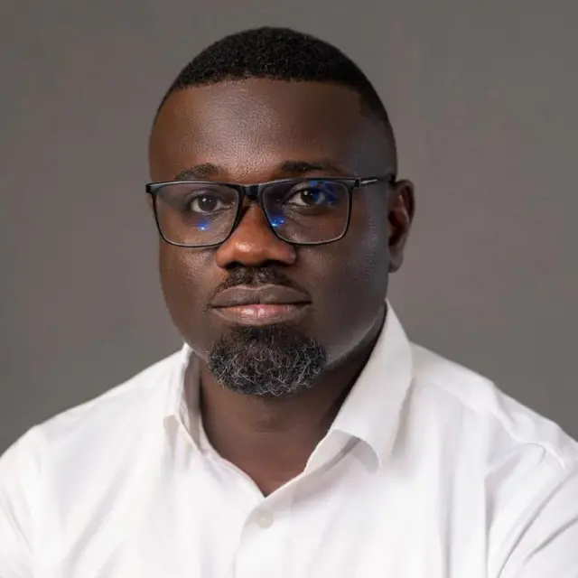 Dr. Bernard Ehirim O. dey wear white shirt for white background