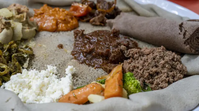 ‘ক্যাম্বাবুর’ - পাতলা রুটি বা প্যানকেকের মত দেখতে খাবারটি 