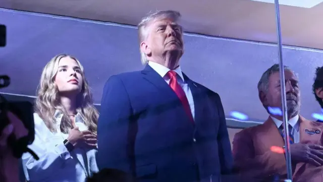 Trump kuri uyu mukino yari yaherekejwe n'umwuzukuru we Kai Trump