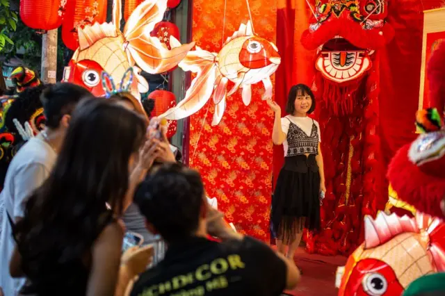 People taking pictures mid Autumn festival