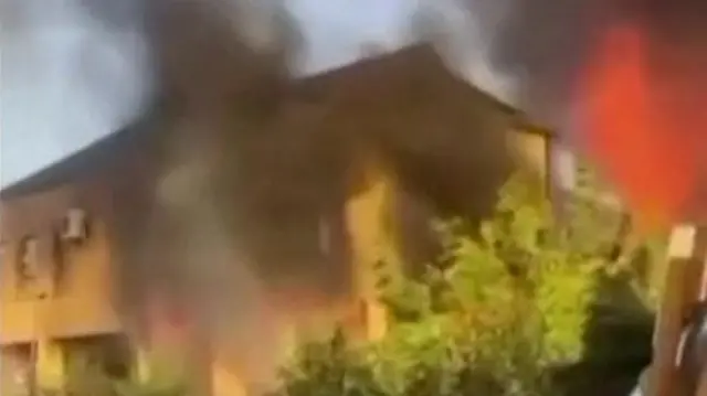 One building dey on fire afta shootings for Derbent