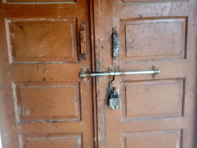 गांव में पीड़िता के घर पर ताला
