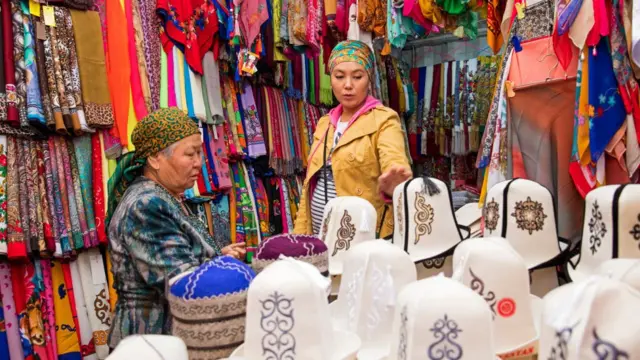 калпак сатуучу келин