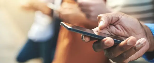 hand holding mobile phone