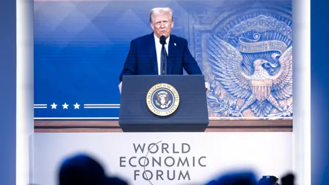 Davos elite nod along as Trump delivers ultimatum