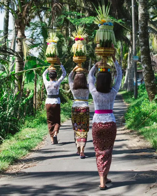 In Bali, many women pair their kebaya with a colourful contrasting sash