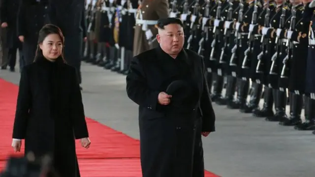 کیم و همسرش