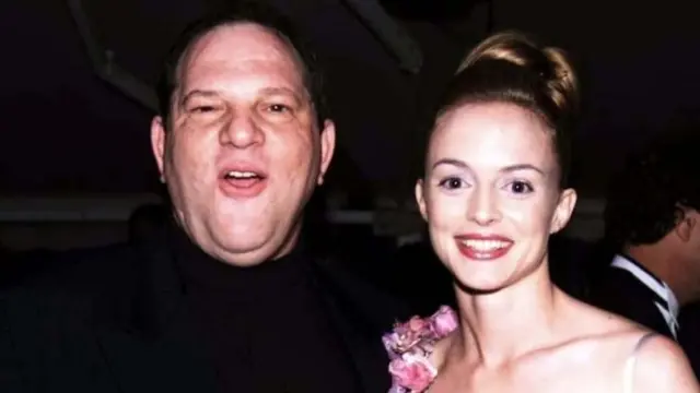 Harvey Weinstein and Heather Graham at a film party in 1999