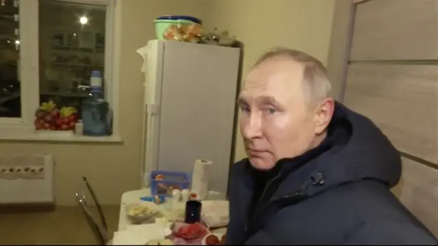 putin in a home in mariupol