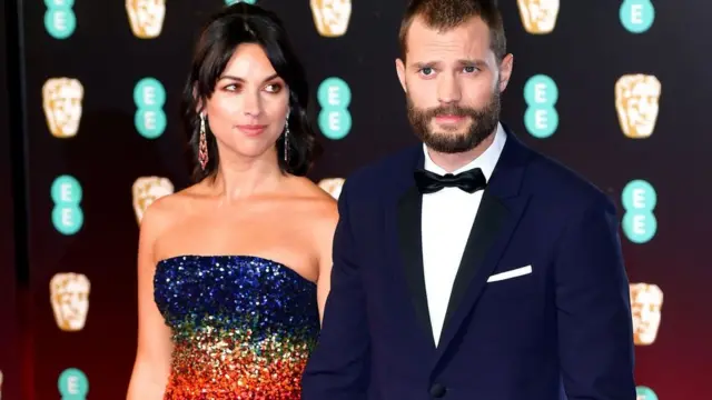 Джейми Дорнан и Амелия Уорнер