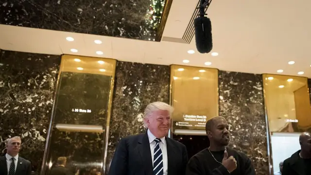 Donald Trump and Kanye West outside the famous golden elevators of Trump Tower, New York City, in December 2016