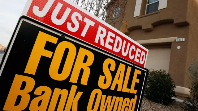 Cartel de una casa a la venta