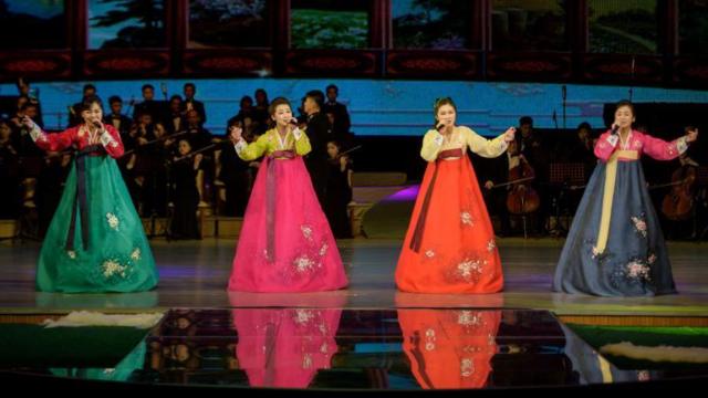 In a photo taken on February 16, 2021 members of Mansudae Art Troupe perform a music and dance routine marking 79th anniversary of Kim Jong Il's birth,
