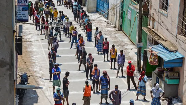 waiting for food packages in India