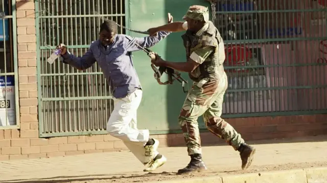 Soldier dey flog civilian man