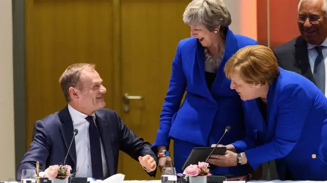 President of the European Council Donald Tusk, British Prime Minister Theresa May and German Chancellor Angela Merkel talk at a round table meeting on April 10, 2019 in Brussels, Belgium.