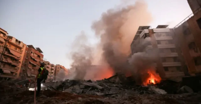 Buildings have collapsed after the air strike in the Dahieh neighbourhood of Beirut