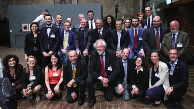 Mr Djalali is pictured with colleagues