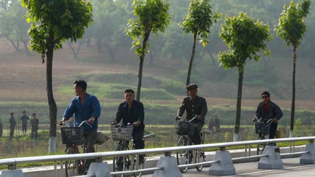 North Koreans ride bikes in Pyongyang (May 2018)