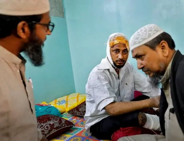 હિંસાનો ભોગ બનેલા યુવકની તસવીર