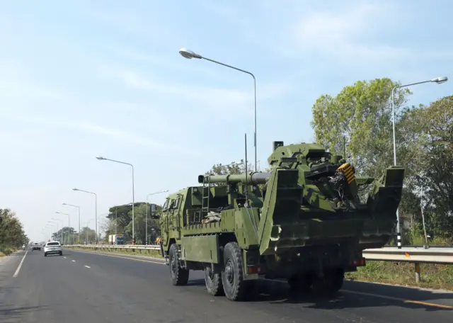 Mandatory Credit: Photo by RUNGROJ YONGRIT/EPA/Shutterstock (16058756m)
A Thai army's self-propelled howitzer moves during clashes between Thai and Cambodian troops in Phanom Dong Rak district, Surin province, Thailand, 09 December 2025. More than 500,000 villagers in the multiple border area have been evacuated following the clashes between Thai and Cambodian troops over the two countries border dispute. According to a statement from the Royal Thai Army, tensions at the Thai-Cambodian border have continued to rise following a clash between Thai and Cambodian troops that resulted in the deaths of three Thai soldiers and the injuries of 28.
Thai and Cambodian troops clash over the border dispute, Phanom Dong Rak, Thailand - 09 Dec 2025