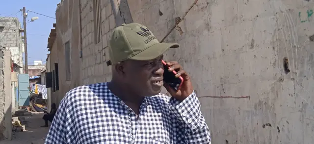 Moustapha Diouf au téléphone